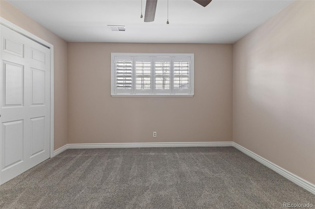 11506 Fowler Dr, Northglenn, CO 80233 - unfurnished bedroom with carpet floors, a ceiling fan, baseboards, and visible vents