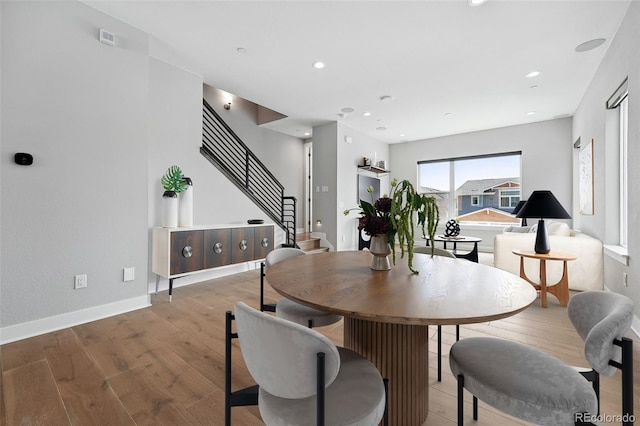 815 Promenade Dr, Superior, CO 80027 - dining space featuring light wood-type flooring, stairs, baseboards, and recessed lighting