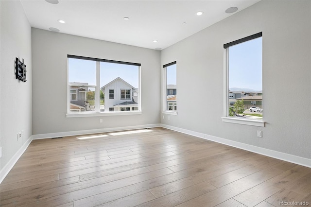 815 Promenade Dr, Superior, CO 80027 - spare room with hardwood / wood-style flooring, baseboards, and recessed lighting