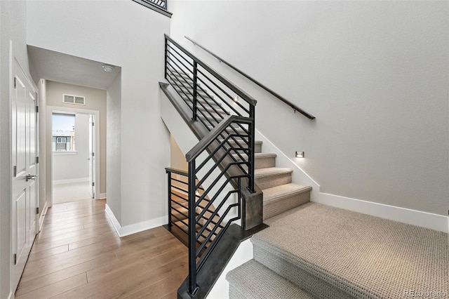 815 Promenade Dr, Superior, CO 80027 - stairs with wood finished floors and baseboards