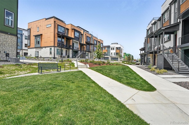 815 Promenade Dr, Superior, CO 80027 - view of community featuring stairway, a residential view, and a yard