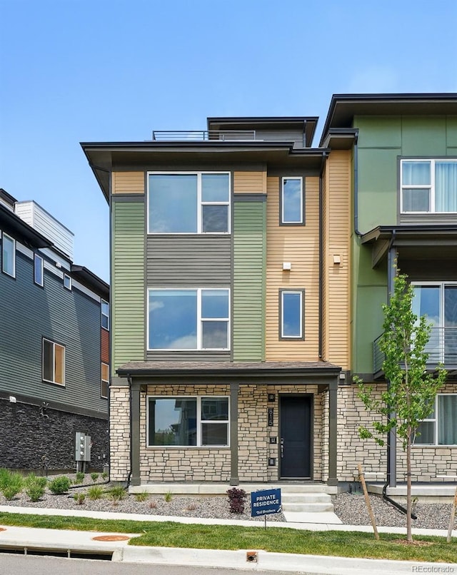 815 Promenade Dr, Superior, CO 80027 - view of front facade with stone siding