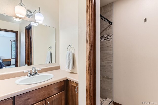 6351 S Andes Pl, Centennial, CO 80016 - bathroom with tiled shower and vanity