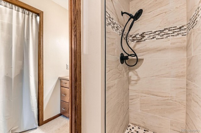 6351 S Andes Pl, Centennial, CO 80016 - full bathroom featuring tiled shower and vanity