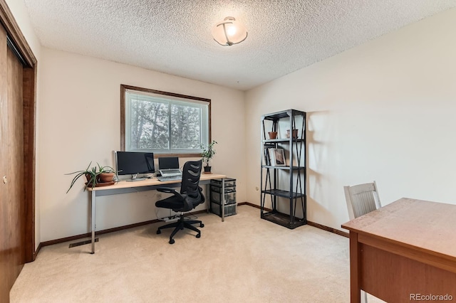 6351 S Andes Pl, Centennial, CO 80016 - office featuring light colored carpet, baseboards, and a textured ceiling