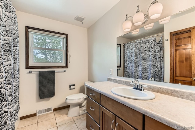6351 S Andes Pl, Centennial, CO 80016 - full bathroom featuring vanity, toilet, tile patterned floors, baseboards, and curtained shower