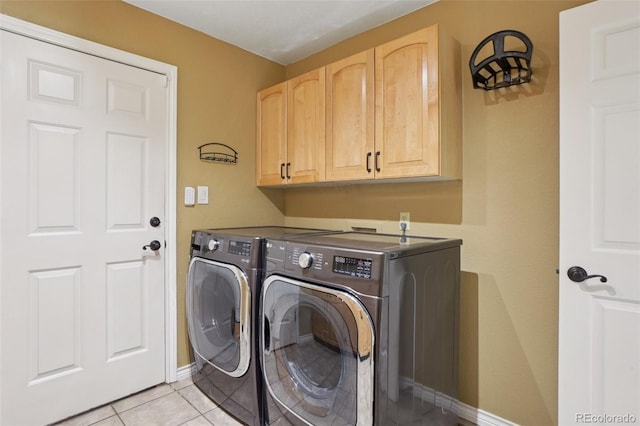 2841 Wyecliff Way, Highlands Ranch, CO 80126 - laundry room featuring independent washer and dryer, cabinet space, and light tile patterned floors