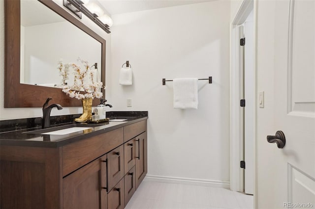 2841 Wyecliff Way, Highlands Ranch, CO 80126 - bathroom with double vanity and baseboards