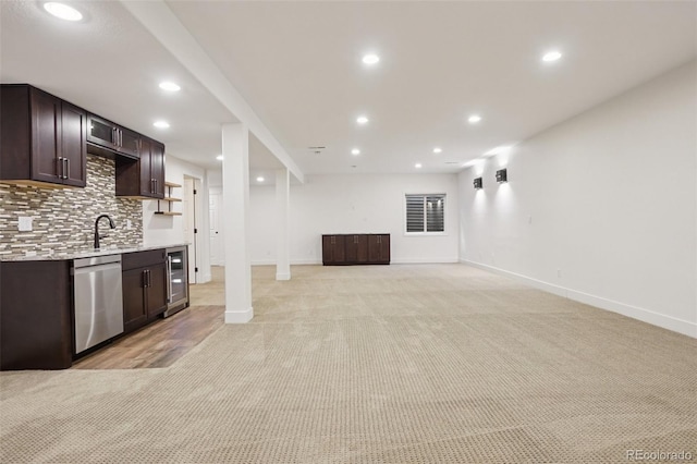 2841 Wyecliff Way, Highlands Ranch, CO 80126 - unfurnished living room featuring beverage cooler, light carpet, and recessed lighting