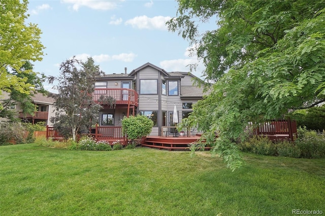 2841 Wyecliff Way, Highlands Ranch, CO 80126 - rear view of property featuring a yard and a wooden deck