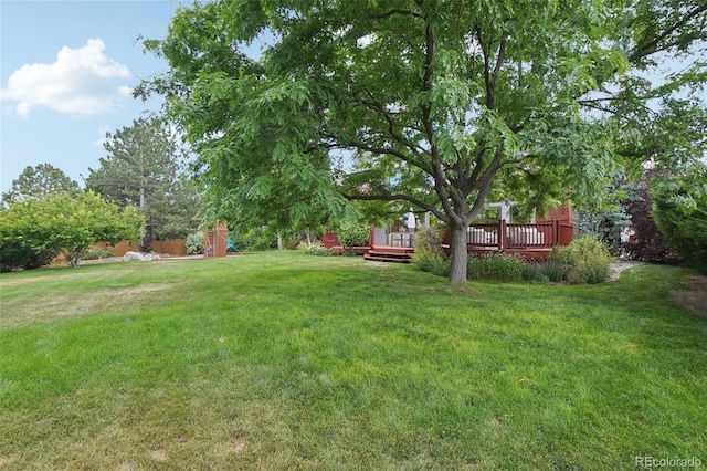 2841 Wyecliff Way, Highlands Ranch, CO 80126 - view of grassy yard featuring a wooden deck