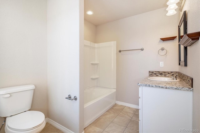 full bathroom with baseboards, bathing tub / shower combination, toilet, tile patterned floors, and vanity