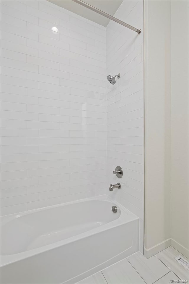 full bathroom with shower / tub combination