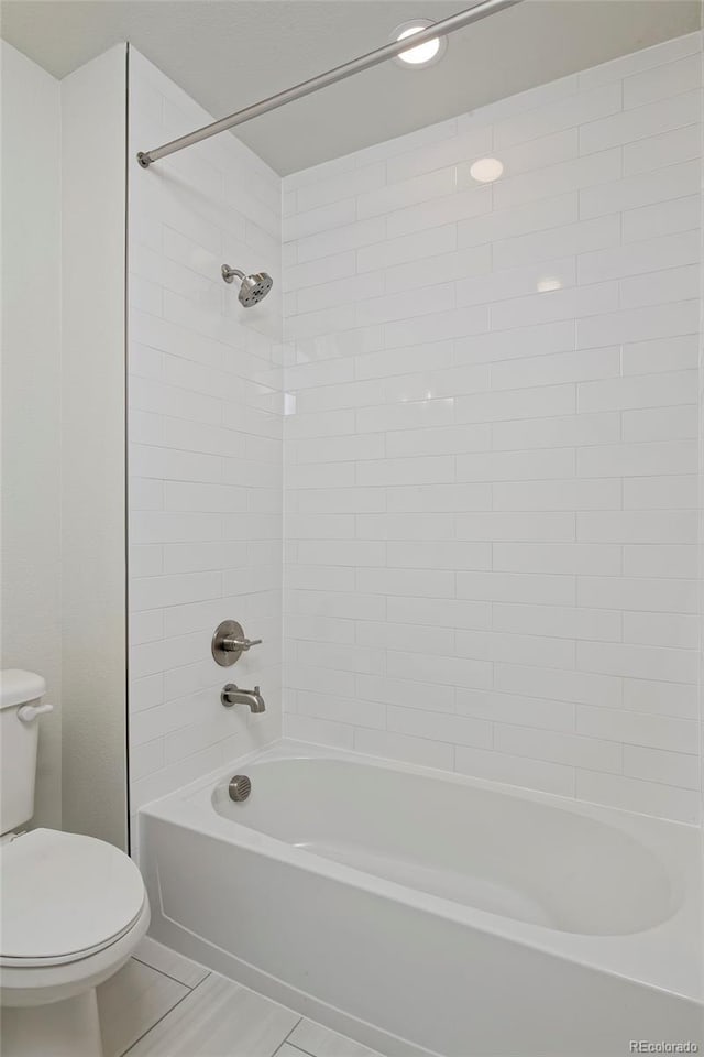 full bathroom featuring shower / washtub combination and toilet