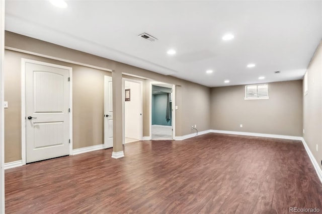 basement featuring dark wood-type flooring