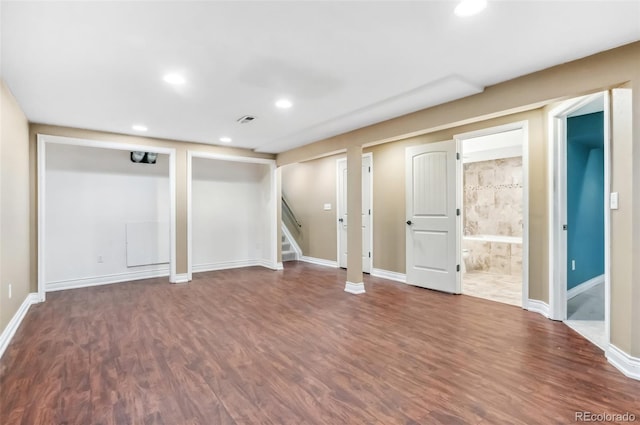 basement featuring hardwood / wood-style flooring