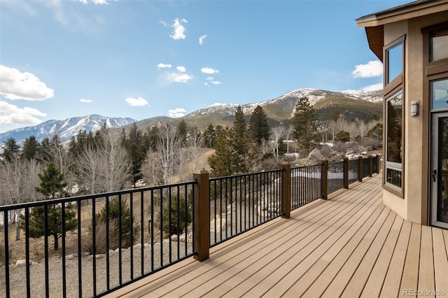 wooden terrace with a mountain view