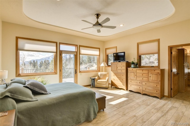 bedroom featuring recessed lighting, light wood-style flooring, ceiling fan, access to outside, and baseboards