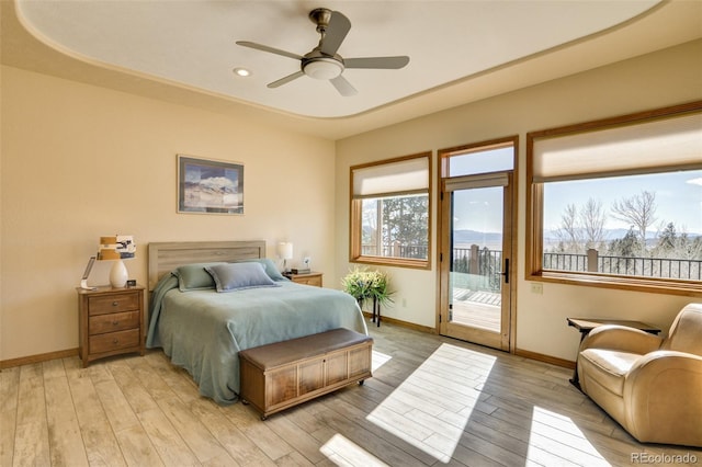 bedroom with access to exterior, baseboards, ceiling fan, and light wood finished floors