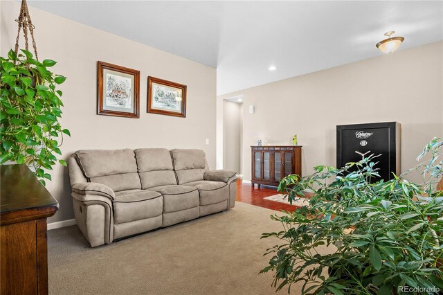 living area with baseboards, carpet flooring, and recessed lighting