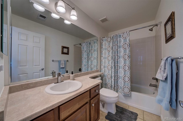 full bathroom featuring shower / bathtub combination with curtain, vanity, tile patterned floors, and toilet