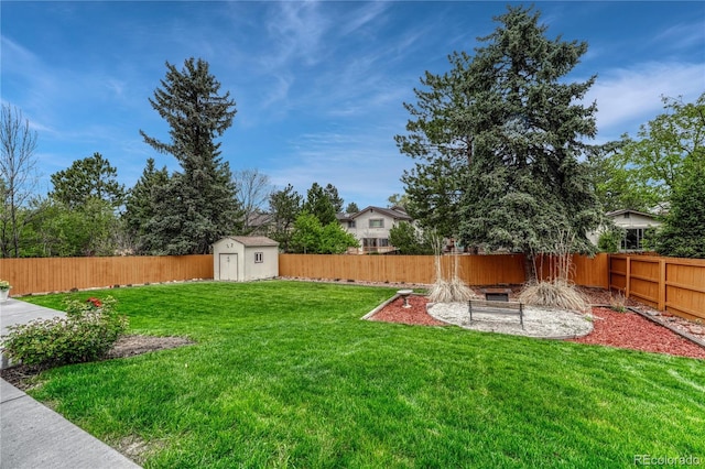 view of yard featuring a shed and an outdoor structure