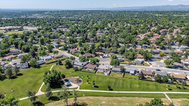 8705 W 86th Dr, Arvada, CO 80005 - aerial view of property and surrounding area with nearby suburban area