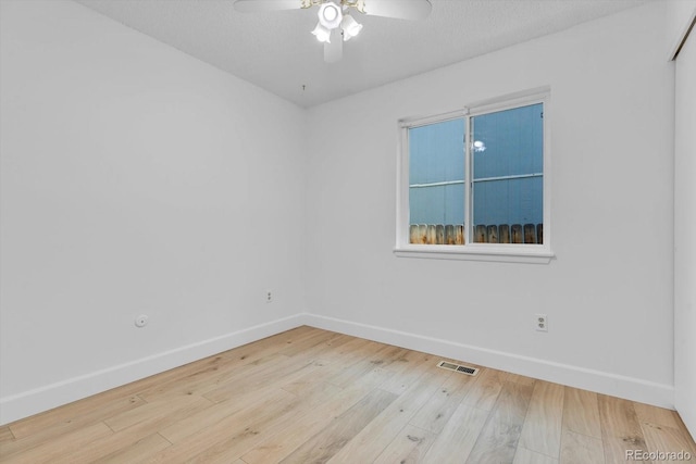 8705 W 86th Dr, Arvada, CO 80005 - empty room featuring hardwood / wood-style floors and a ceiling fan