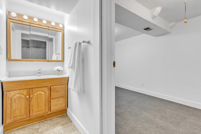 8705 W 86th Dr, Arvada, CO 80005 - bathroom with vanity and baseboards