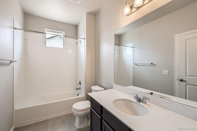 bathroom with vanity, bathtub / shower combination, toilet, and tile patterned floors