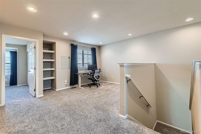 office area with built in features, recessed lighting, light colored carpet, and baseboards