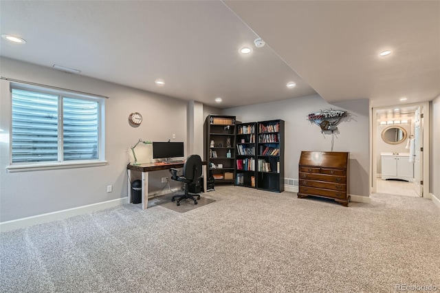 office area featuring light carpet, baseboards, and recessed lighting