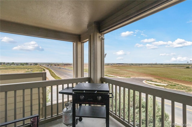 23376 E 5th Pl Unit 201, Aurora, CO 80018 - balcony featuring grilling area and a view of countryside