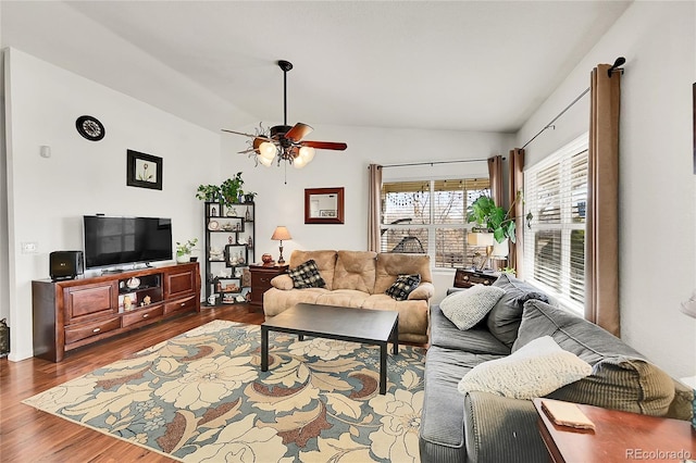 living room with lofted ceiling, dark wood-style floors, and a ceiling fan