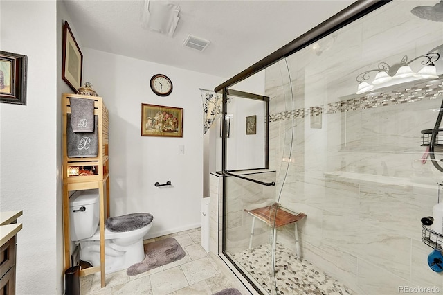 bathroom with toilet, a stall shower, vanity, and visible vents