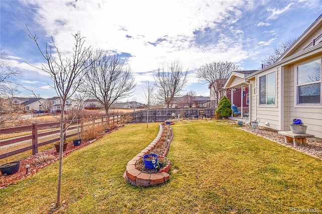 view of yard featuring a fenced backyard