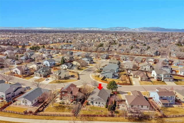 bird's eye view with a residential view and a mountain view