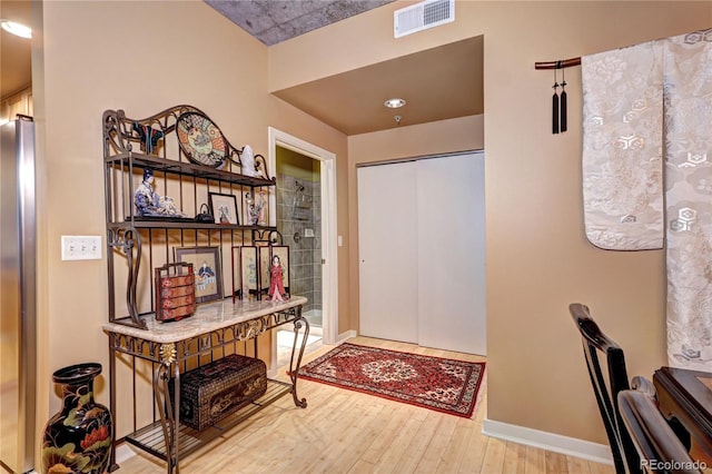 foyer entrance featuring hardwood / wood-style flooring