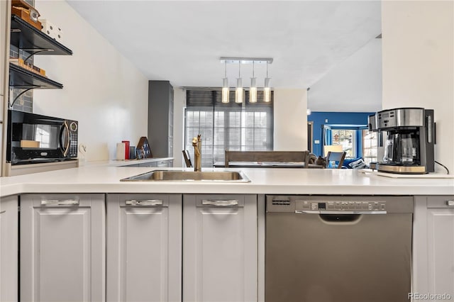 kitchen with dishwasher, sink, kitchen peninsula, and white cabinets