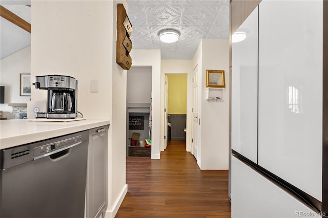 kitchen with dark wood-type flooring and dishwasher