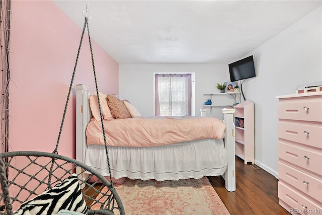 bedroom featuring dark wood-type flooring