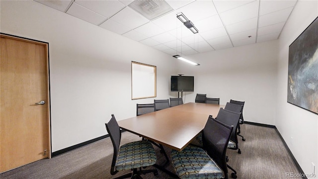 office area featuring carpet floors and a drop ceiling