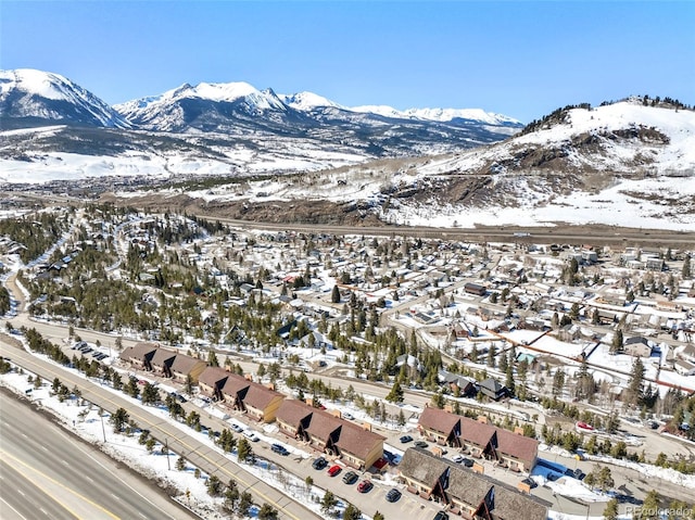 150 Evergreen Rd Unit 204, Dillon, CO 80435 - snowy aerial view featuring a mountain view and a residential view