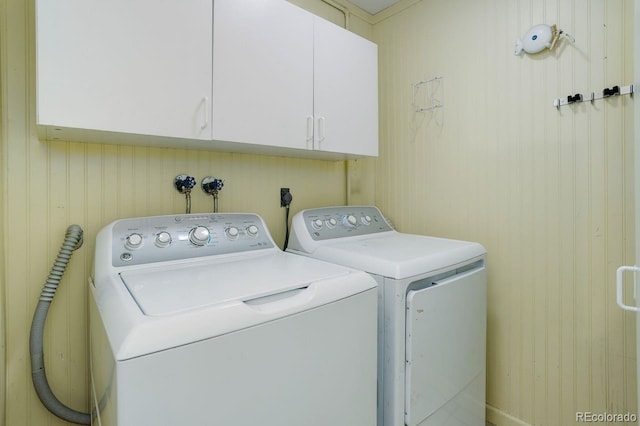 8795 Rudd Rd, Evergreen, CO 80439 - laundry room featuring cabinet space and separate washer and dryer