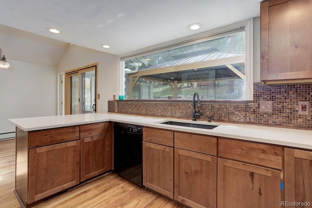 8795 Rudd Rd, Evergreen, CO 80439 - kitchen with a sink, dishwasher, light wood-type flooring, decorative backsplash, and lofted ceiling