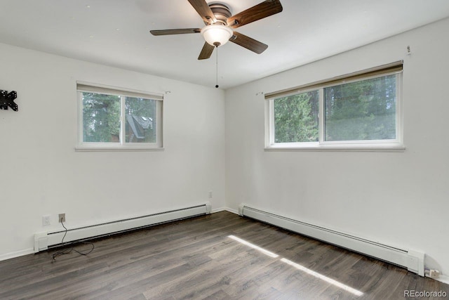 8795 Rudd Rd, Evergreen, CO 80439 - spare room with a baseboard heating unit, healthy amount of natural light, and a ceiling fan