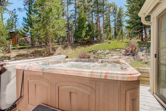 8795 Rudd Rd, Evergreen, CO 80439 - view of patio with a hot tub