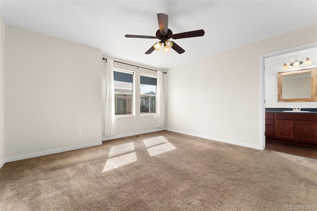 3692 Celestial Ave, Castle Rock, CO 80109 - unfurnished bedroom featuring a sink, carpet floors, baseboards, and ensuite bath