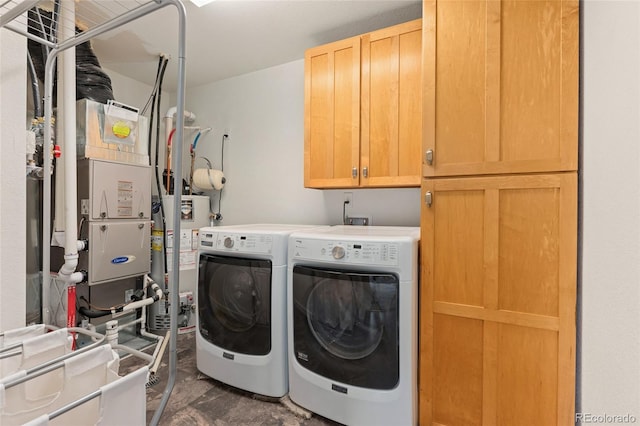3692 Celestial Ave, Castle Rock, CO 80109 - washroom featuring cabinet space, gas water heater, and washer and clothes dryer