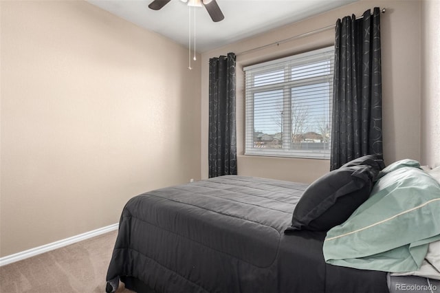 bedroom featuring ceiling fan and carpet flooring